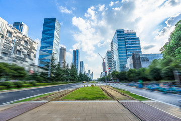 city road through modern buildings in nanjing