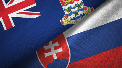 Cayman Islands and Slovakia two flags textile cloth, fabric texture