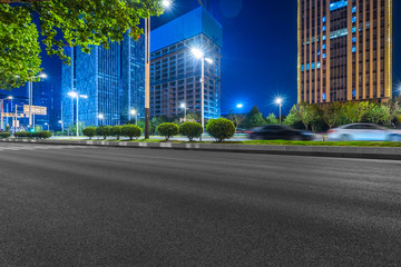 Empty asphalt road through modern city in nanjing, China