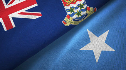Fototapeta premium Cayman Islands and Somalia two flags textile cloth, fabric texture