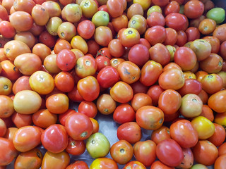 Fresh organic tomoto backgroud texture.