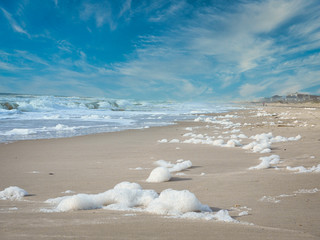 seafoam on the beach