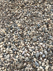 Sea pebbles. Abstract background of sea pebbles. Selective focus.