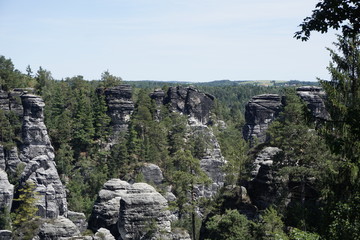 Fototapeta na wymiar View over the famous sandstone rock of the Bastei area in Saxon Switzerland