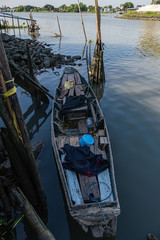 Fototapeta premium Rowboat in canal nature, landscape quiet place