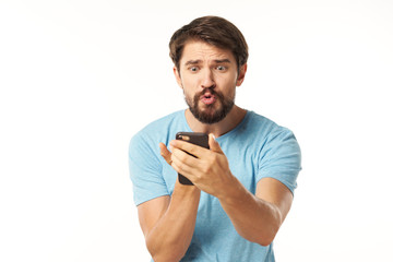 portrait of young man with mobile phone