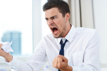 businessman looking at camera in office