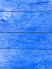 Classic blue color of the year 2020 of wooden background