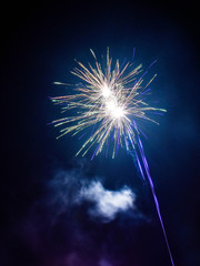 Blue fireworks in the night sky