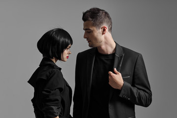 man and woman fighting with gun