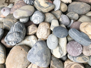 Abstract smooth round pebbles sea texture background