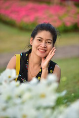 Woman lying in Flowers garden