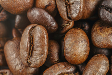 Roasted coffee beans closeup. Background texture.