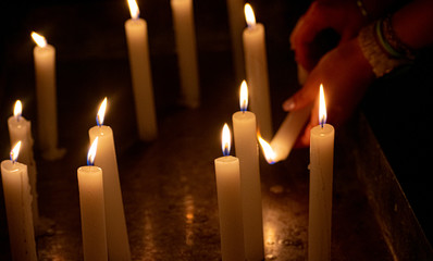 Lighting candles in an orthodox church
