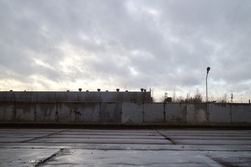 Industrial zone on the outskirts of a big city in autumn