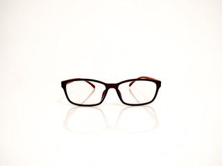 Black glasses placed on a clean white background.