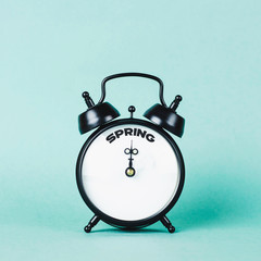 Vintage alarm clock and text 