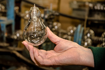 Lamp production at the factory, manufacturing process.