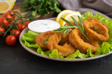 squid rings deep fried with crispy crust.