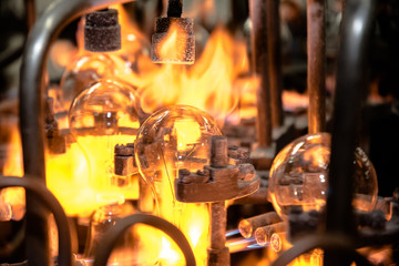 Lamp production at the factory, manufacturing process.