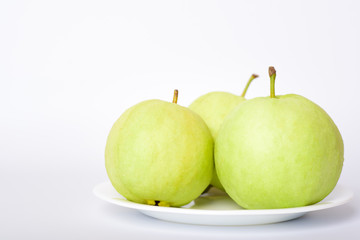 Fresh organic guava tropical fruit on white background. Healthy food high vitamin C concept