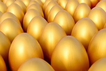 Lots of golden eggs together, close-up