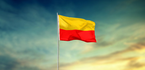 KARNATAKA FLAG FLYING HIGH BLUE SKY BACKGROUND