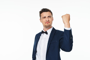 happy businessman with arms raised