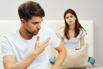 young couple having breakfast in bed