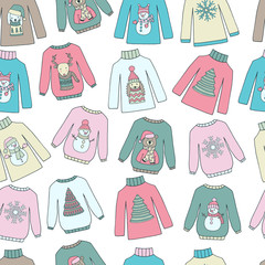 Seamless pattern with winter sweaters on white background