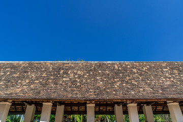 Old temple roof with blue sky