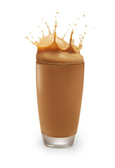 chocolate milk or milk tea splashing out of glass isolated on white with clipping path
