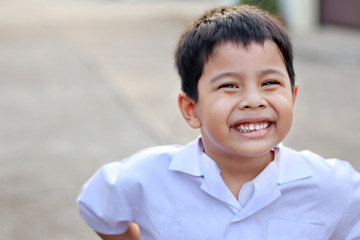 Portrait of a happy smiling little boy close-up. Happy face. concept of  child development and...