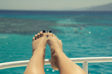 Beautiful female legs with a pedicure