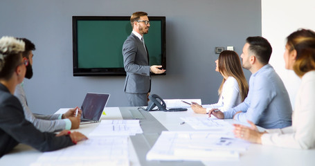 Perspective businesspeople having meeting in conference room