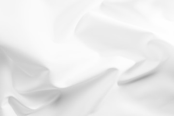 Fototapeta premium Abstract white fabric texture background. Cloth soft wave. Creases of satin, silk, and cotton. 