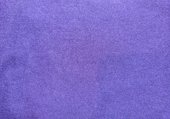 Fototapeta premium Purple cloth texture background. Material for clothes.