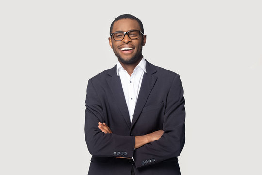 Portrait of happy african american young businessman in formal suit.