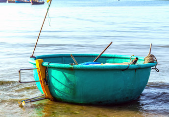 Vietnamese fishing coracles on beach tribal boats at fishing village