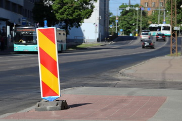 Caution traffic sign. Road works.