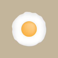 Top view closeup Fried egg isolated on brown background.