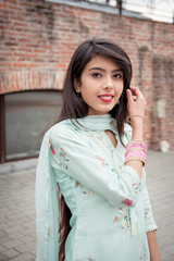 Chudiyan. Bracelets on the girl's hands. Traditional accessories of Indian girls. Girl in...