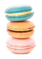 Different tasty macarons on white background
