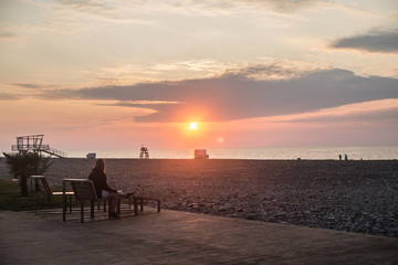 Obraz premium Batumi / Georgia 20. November 2019 photo of sunset over black sea beach