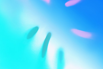 Bright Blue color tropical palm leaf shadow in trendy duotone pink mint green neon background.