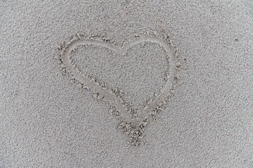 Heart in sand on beach