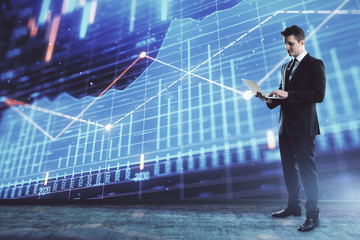 Obraz premium Businessman and forex graph hologram. Double exposure. Concept of financial education and analysis
