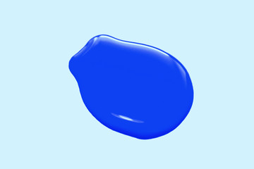 Spot of blue nail Polish isolated on a light blue background.abstract background selective focus