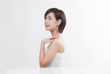 Fototapeta na wymiar Young beautiful Asian female model on the white background