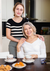 Two women at kitchen
